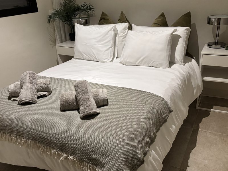Bedroom made up with fresh towels in Benahavis